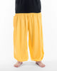 Plus Size Solid Color Unisex Harem Pants in Light Yellow