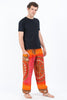 Tribal Chakras Unisex Harem Pants in Orange